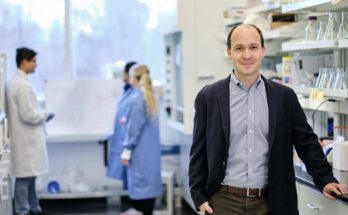 Dr. Eric Josephs takes a moment to pose for a picture in the lab.