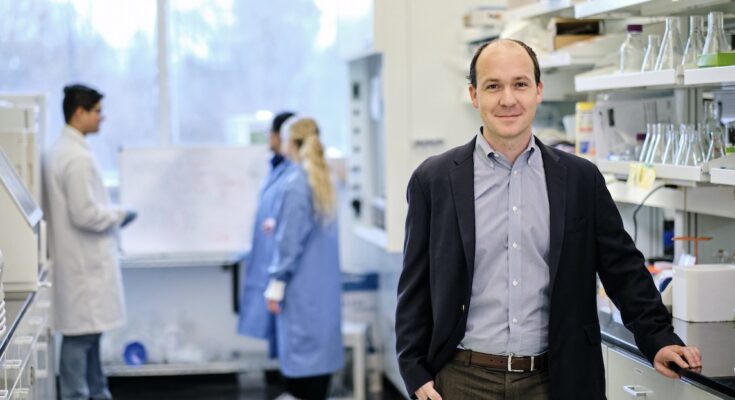 Dr. Eric Josephs takes a moment to pose for a picture in the lab.