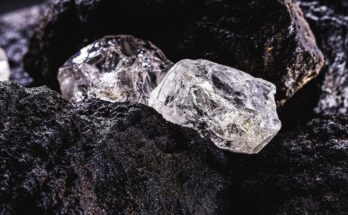 Rough diamond, precious stone in mine.