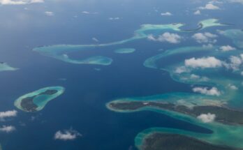 Aerial view photograph of small islands in the Solomon Islands.
