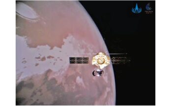 photo of a golden spacecraft in orbit around mars.