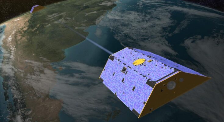 A concept illustration of the Gravity Recovery and Climate Experiment (GRACE) satellites over Earth.