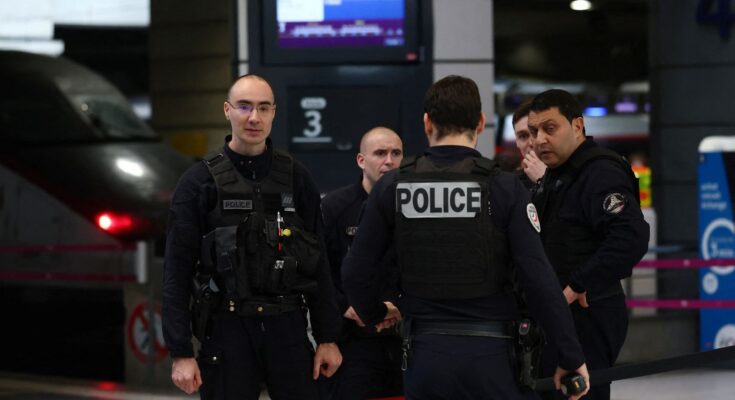 Police secure the area at the Montparnasse station. Pic: Reuters