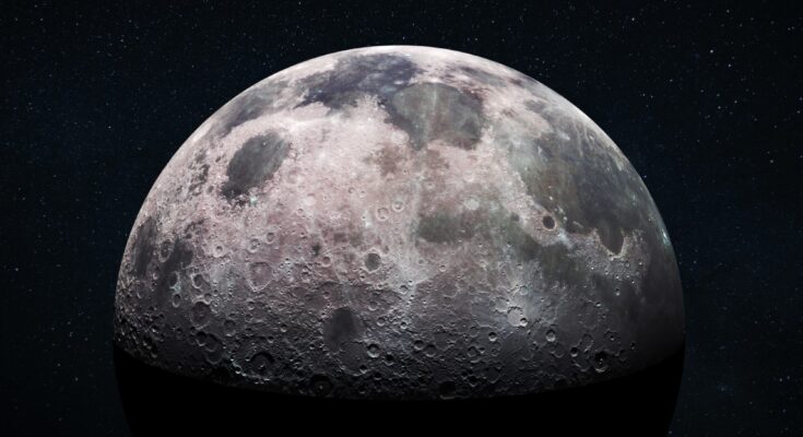 Space view of the moon's cratered surface with a star-filled outer space background. Deep space exploration and astronomy concept. Moon with detailed craters and surface