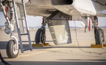 NASA’s Cross Flow Attenuated Natural Laminar Flow test article is mounted beneath the agency’s F-15 research aircraft ahead of the design’s high-speed taxi test