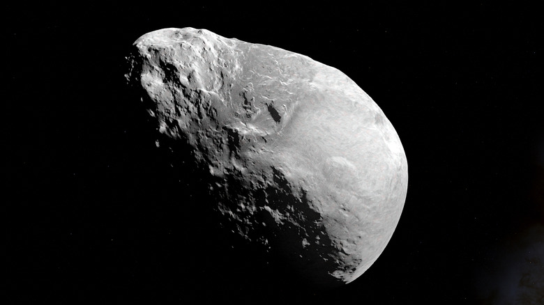 El asteroide trasero está parcialmente cubierto de sombras.